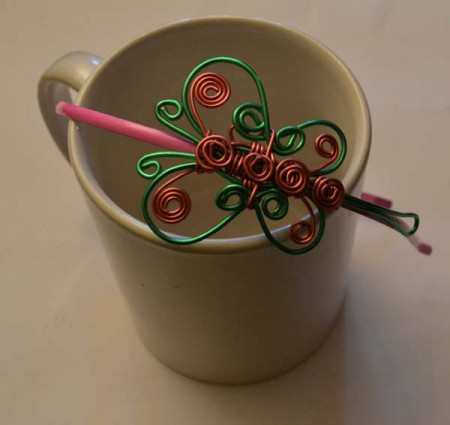 Diadema mariposa rosa y verde